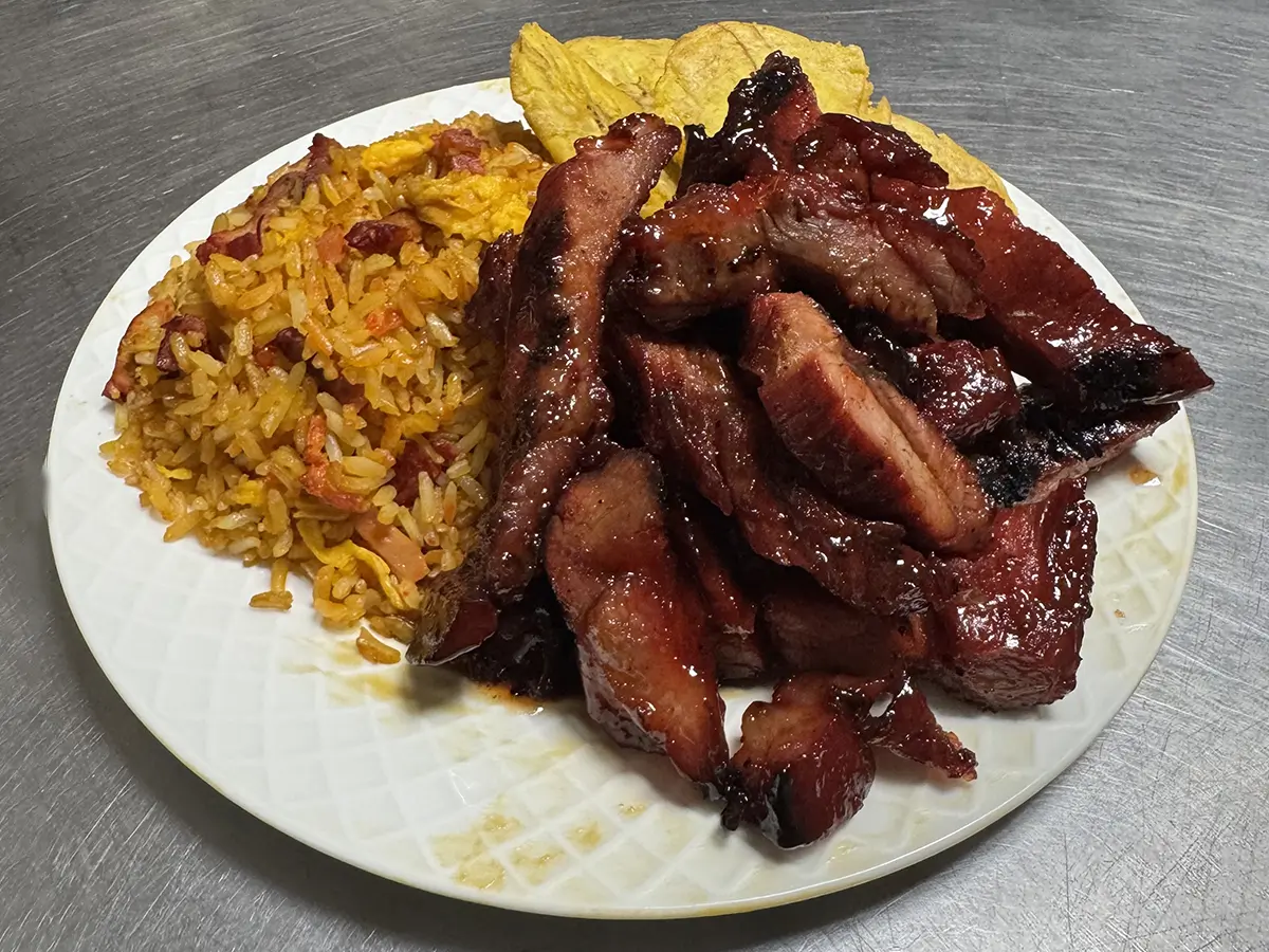 Glazed BBQ pork with rice and plantain chips at Casa China, a Chinese Restaurant in Sanford